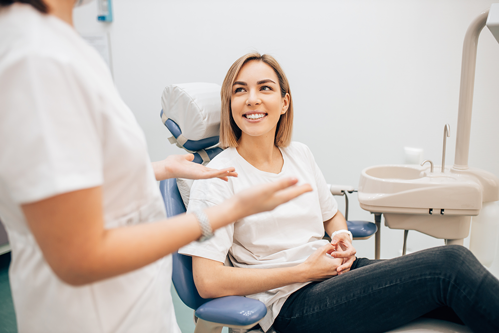 happy_dental_patient Happy dental patient in exam room